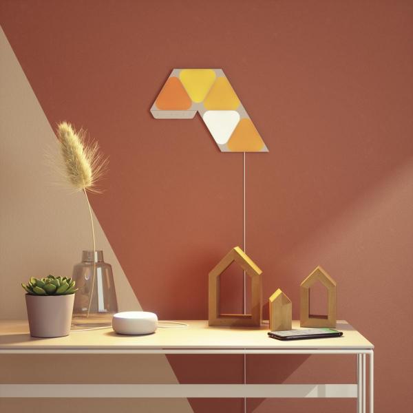 Nanoleaf - Shapes Triangles Mini Kit (starter+9)    ,nanoleaf,shapes,triangles,mini,kit,(starter+9),paineis,de,luz,triangulares,que,se,conectam,entre,si,ate,77,unidades,por,carregador,ac,(e,511,unids,no,total),controlaveis,por,wifi,têm,um,sensor,audio,